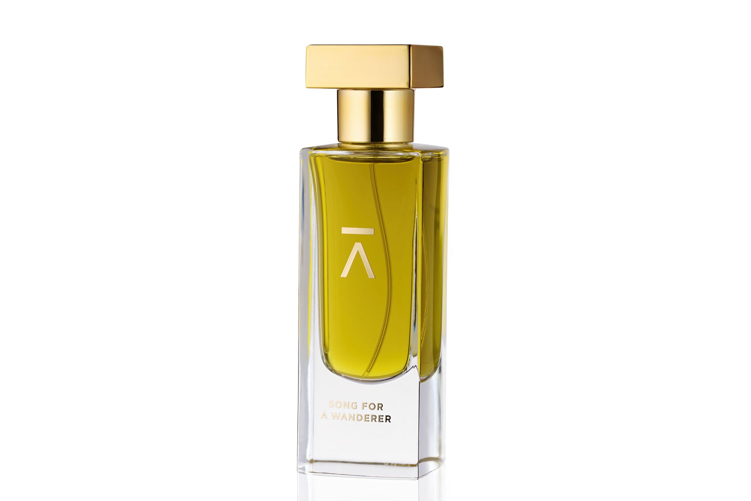 Studio photograph of a ‘Song For A Wanderer’ perfume bottle by Azman Perfumes in collaboration with Chris Maurice, set against a white background. The bottle reflects a green yellow, fresh, and mysterious aesthetic, highlighting elements such as smoke, wet land, jasmine, bergamot and oud.