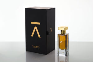 Studio shot of the 'Killer Vavoom' perfume bottle and box by Azman Perfumes, created in collaboration with Miguel Matos, renowned Fragrantica writer and independent nose. The fragrance features notes of chocolate, Osmanthus, and iris, captured against a white background