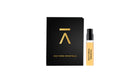 Studio photograph of the ‘Nocturnal Immortal’ 2ml sample with sleeve by Azman Perfumes, created in collaboration with Julien Rasquinet. Set against a white background, the sample reflects a woody, oriental, and mysterious aesthetic. The perfume features key notes of Fir Balsam Absolute, Orange Bitter Oil, Cistus Labdanum, Vetiver Oil Haiti, and Hay Absolute, embodying a rich and natural essence.