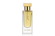 Studio photograph of a ‘Riad Jasmine’ perfume bottle by Azman Perfumes in collaboration with Chris Maurice, set against a white background. The bottle reflects a pale yellow, veggie, and mysterious aesthetic, highlighting elements such as berries, date, and oud.
