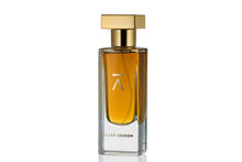 Studio shot of the 'Killer Vavoom' perfume bottle by Azman Perfumes, created in collaboration with Miguel Matos, renowned Fragrantica writer and independent nose. The fragrance features notes of chocolate, Osmanthus, and iris, captured against a white background